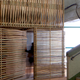 Illustration for article titled These Bamboo Micro-Homes Would Turn Abandoned Buildings Into Villages